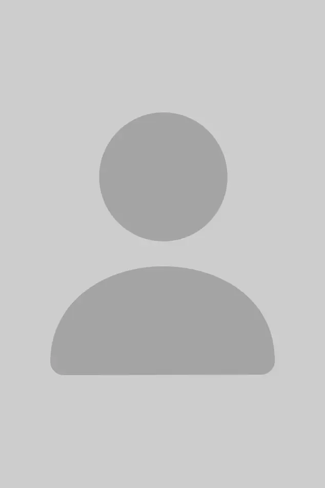 A generic placeholder image of a faceless person silhouette against a light gray background. No distinct features are visible.